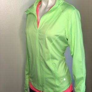 Neon green athletic jacket with lace panel